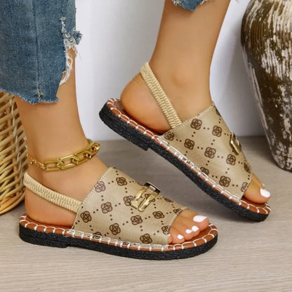 Sophisticated summer sandals for women with a flat heel, offering comfort and style for leisure activities, with a solid pattern.