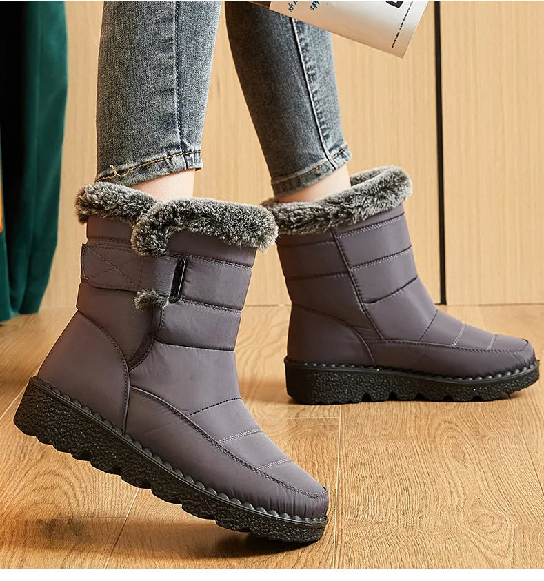 Luxurious handmade ankle snow boots for women, combining high-quality materials and a trendy design for the winter season.