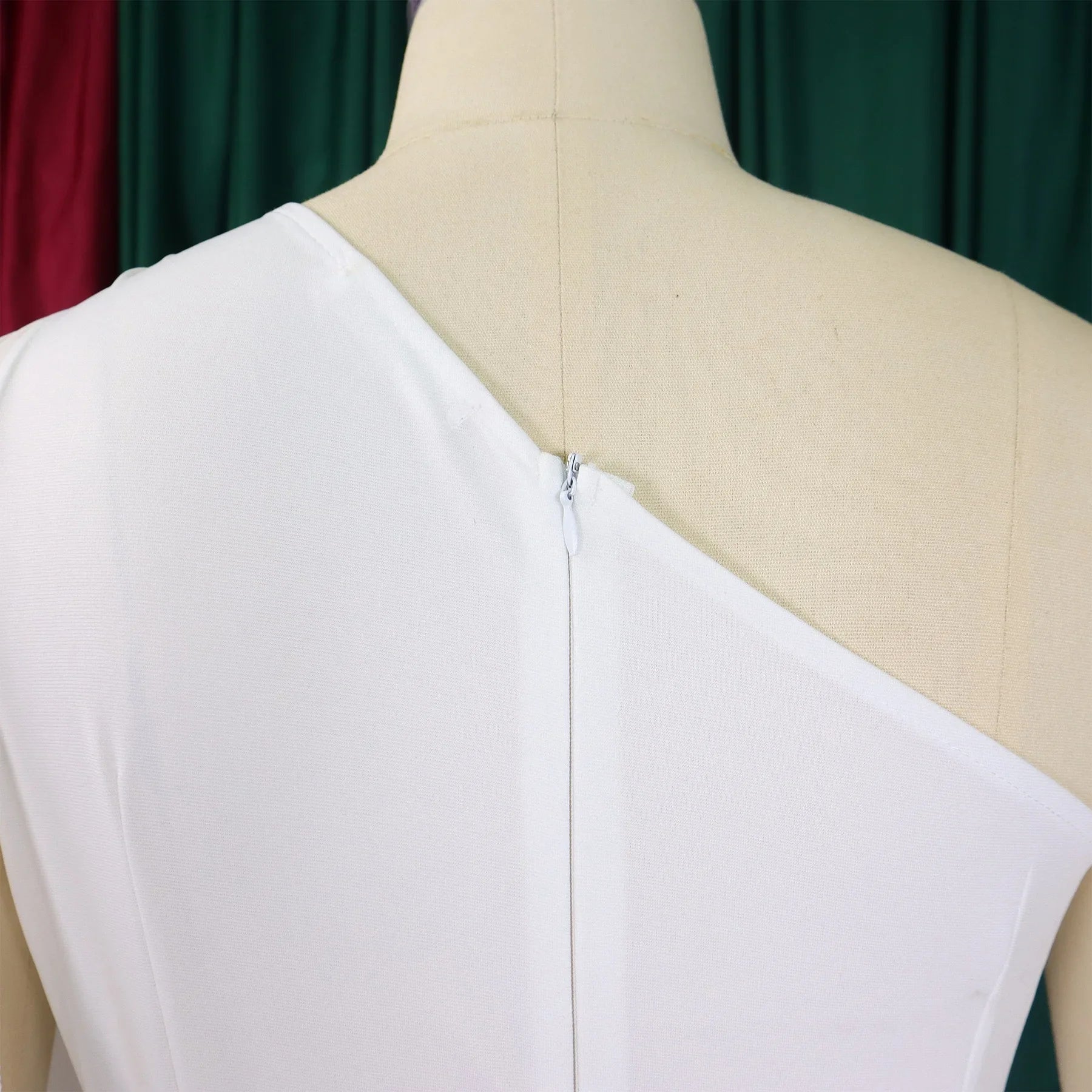 Elegant one shoulder high waisted jumpsuit for women featuring luxurious flying sleeves, ideal for stylish and sophisticated looks.