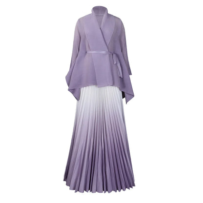 Elegant CM.YAYA autumn/winter outfit featuring a gradient two-piece set with a full sleeve blouse and elastic waist pleated long skirt, combining comfort and luxury for mid-age women.
