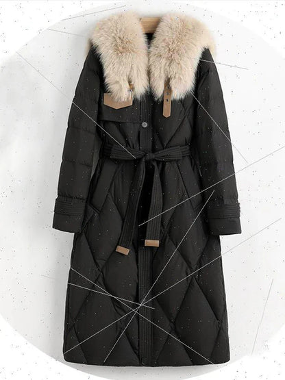 Elegant women's parka showcasing the richness of a 90% white duck down filling, perfect for staying cosy in winter.