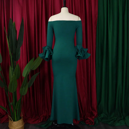 Model wearing the FairyShely Plus Size Off Shoulder Long Sleeve Dress, embodying elegance and comfort for the modern woman with curves, perfect for spring outings.