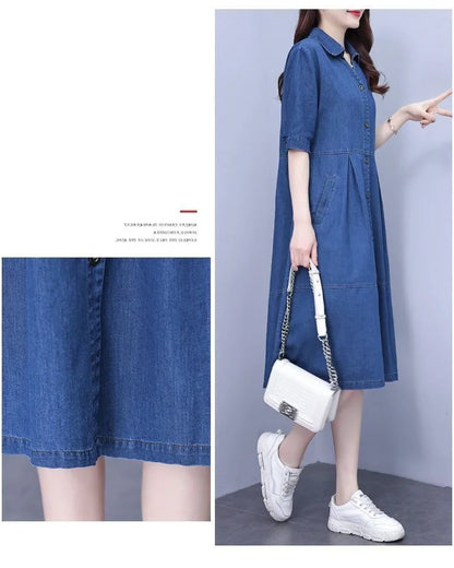 Full view of the knee-length oversized denim dress with pockets, illustrating a relaxed fit and sophisticated style for everyday luxury.