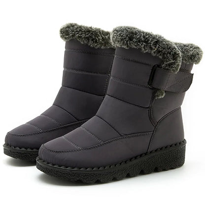 Luxury women's waterproof ankle snow boots with fur, showcasing a stylish low-heel wedge design for winter comfort and elegance.