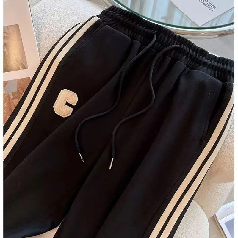 Close-up of the luxurious embroidered detailing on the coat of the High-End Women's Autumn Winter Leisure Sports Set, showcasing exquisite craftsmanship.