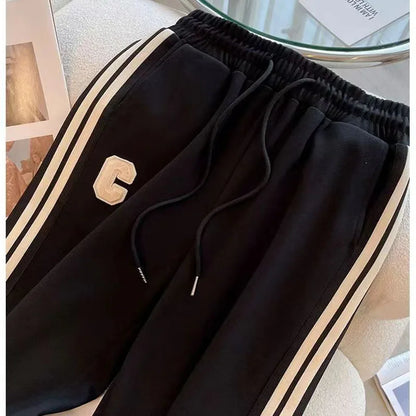 Close-up of the luxurious embroidered detailing on the coat of the High-End Women's Autumn Winter Leisure Sports Set, showcasing exquisite craftsmanship.