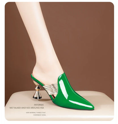 Sophisticated British style high heel mules for women, highlighting the exquisite craftsmanship and solid colour pattern.