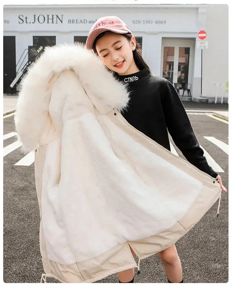 Glamorous girls winter jacket in patchwork design, combining comfort and sophistication for ages 5-14.