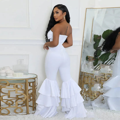 Side angle of a stylish women's strapless jumpsuit featuring a flattering slim fit and ankle-length pants, designed for a modern high street fashion statement.