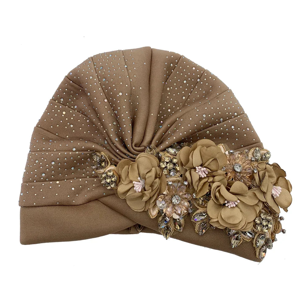 Elegant African Turban Cap with Rhinestone Accents for Women, showcasing luxurious design, ideal for stylish head wraps.