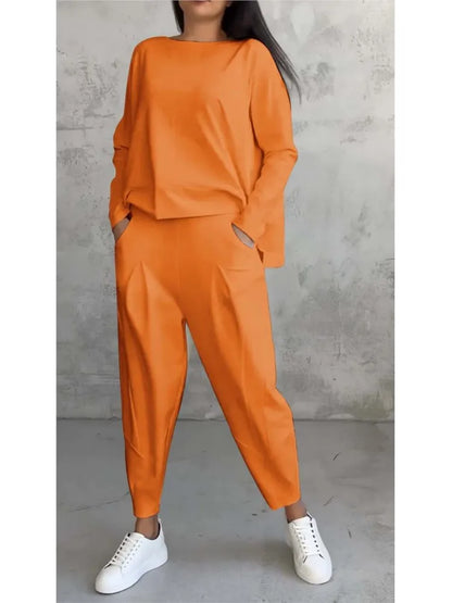 Fashionable women’s sports outfit displayed with a focus on the pullover closure and o-neck collar, combining style with functionality for active lifestyles.