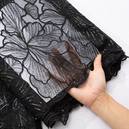 Elegant African Milk Silk lace with intricate embroidery and sequins, showcasing 51-52 inches of luxury fabric suitable for opulent Nigerian wedding dresses.