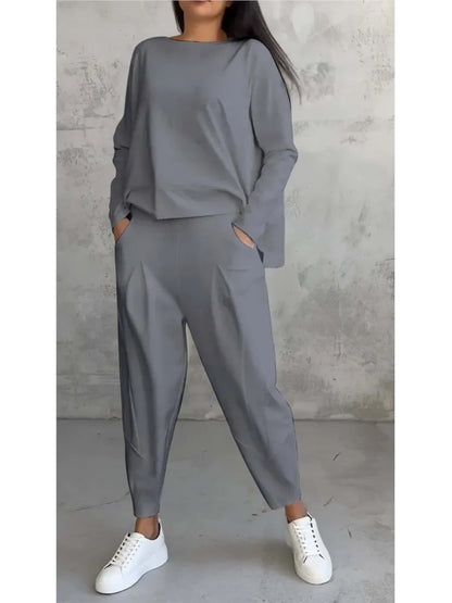 Luxurious polyester fabric composition of a women's casual sports set, combining comfort and contemporary fashion.