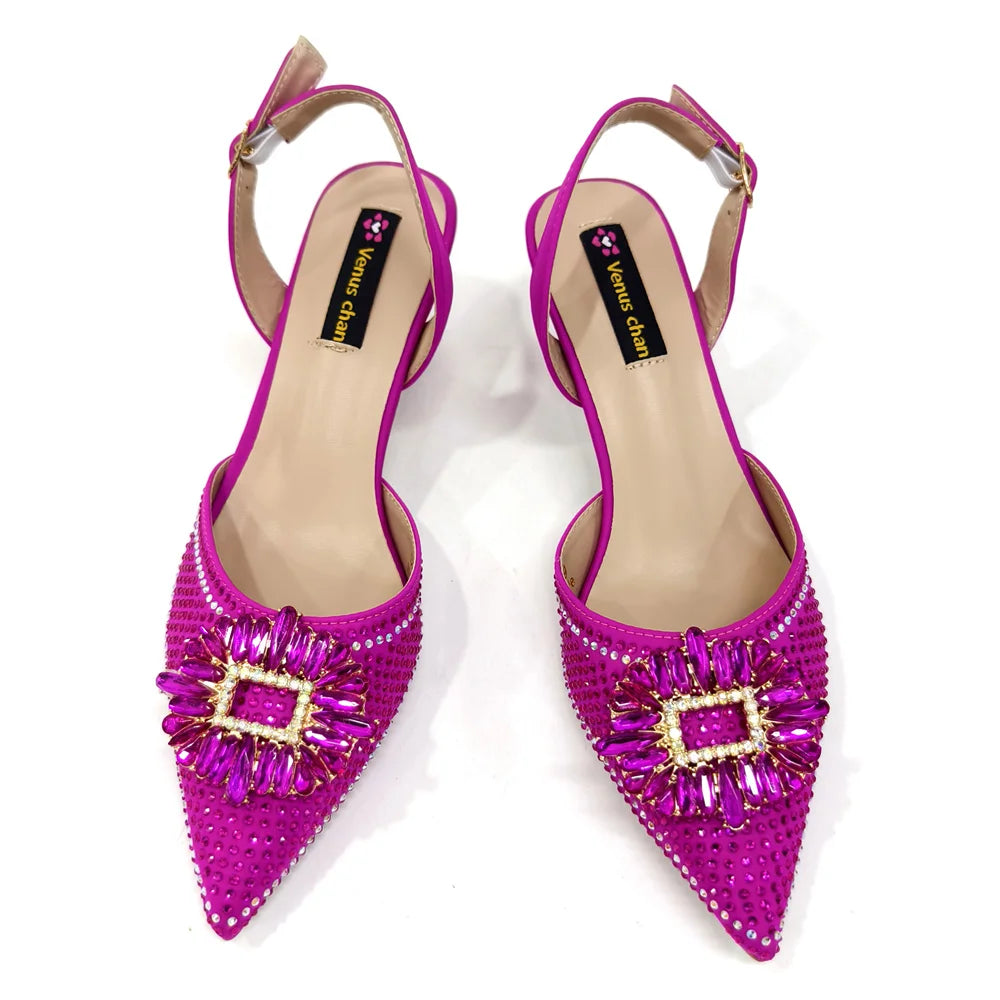 Close-up of stylish women's party shoes showcasing intricate bling details, ideal for weddings and formal events.