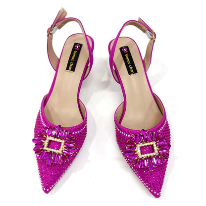 Close-up of stylish women's party shoes showcasing intricate bling details, ideal for weddings and formal events.