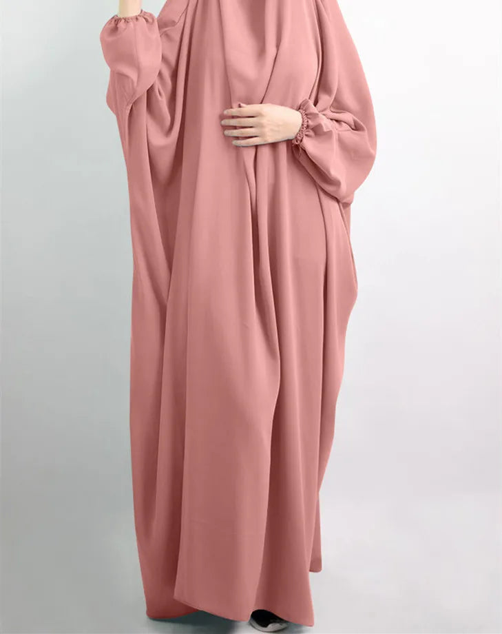 Chic and elegant Muslim robe featuring a slight stretch design, ideal for all-season wear, combining modern fashion with traditional elegance.