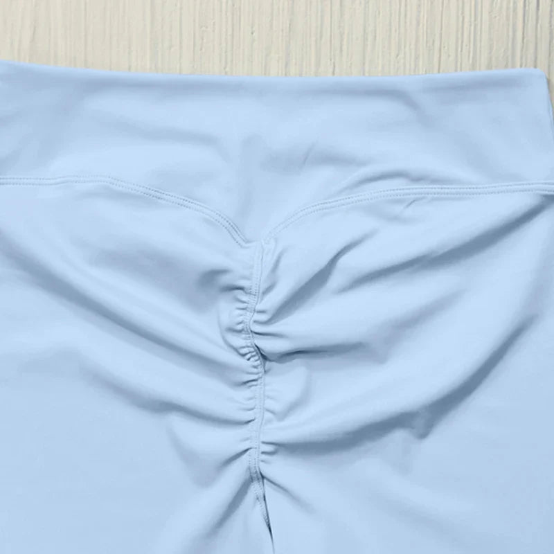 Trendy high elastic yoga shorts from a luxury women's sports set, designed for breathability and enhanced performance.