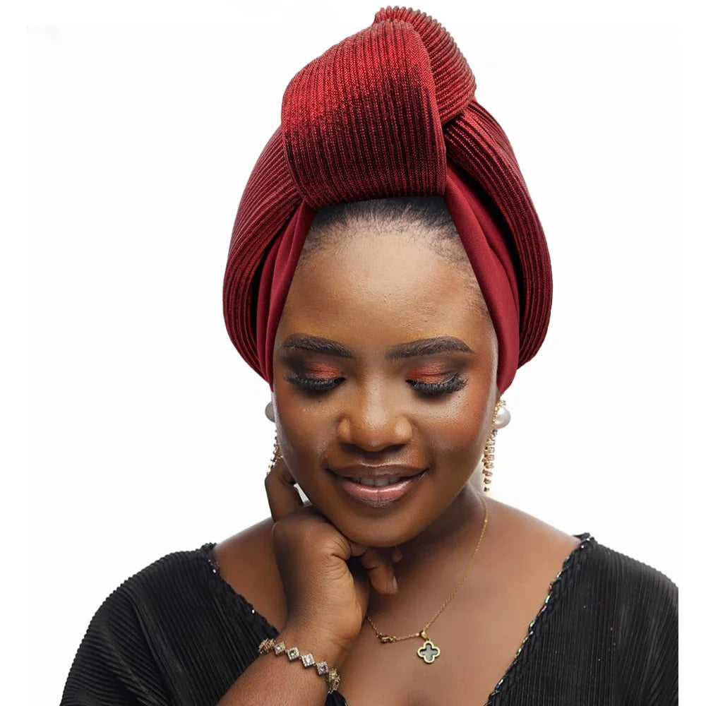 Trendy African Gele headtie for women, featuring a fashionable glitter knot design, size 56-58cm, ideal for sophisticated attire.