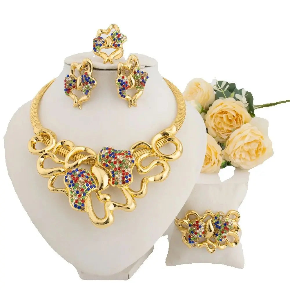 Elegant gold plated earrings featured in a luxurious 4-piece jewelry set for women, perfect for special events.