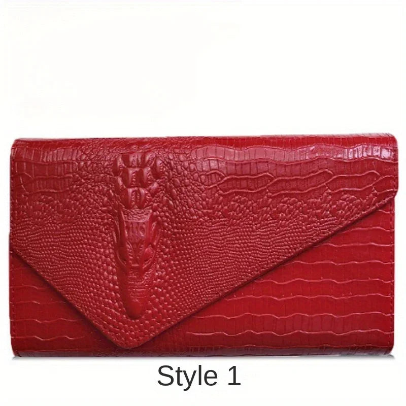 Interior view of women's crocodile print clutch bag, featuring an interior slot pocket for organisation and convenience.