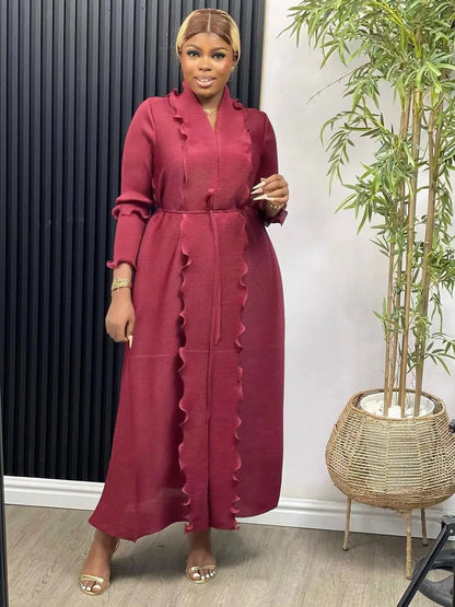 Model wearing a stylish ankle-length loose abaya dress, exuding elegance and comfort for Spring/Summer events.