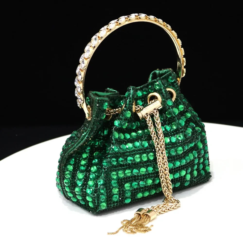 Chic Venus Chan Green Handbag featuring a versatile metal handle and long chain shoulder strap, beautifully complementing the pointed toe high heels.