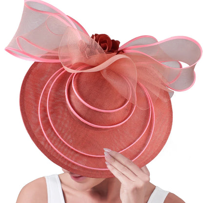 Stylish women's fascinator hat featuring a beautiful floral embellishment, perfect for formal occasions.
