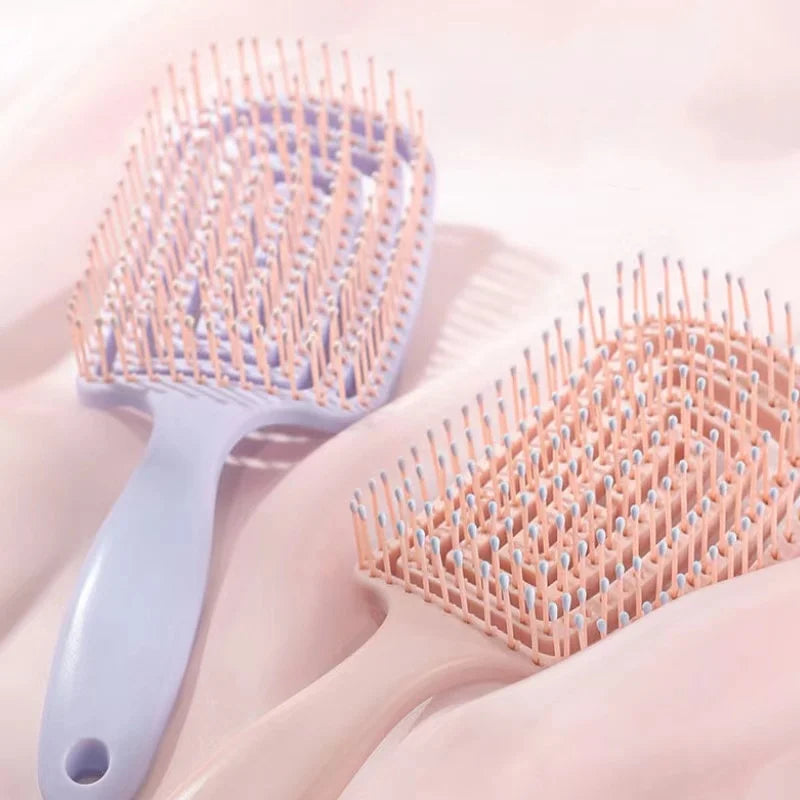 Elegantly designed elastic hollow out massage comb for luxurious hair styling and fast detangling, ideal for a soothing scalp massage.