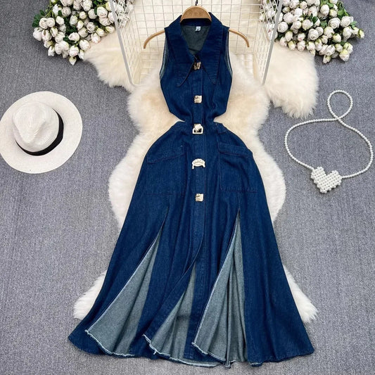 Elegant sleeveless denim dress for women featuring a turn-down collar, high waist A-line design, and sophisticated mid-calf length, perfect for a casual yet luxurious autumn or winter look.