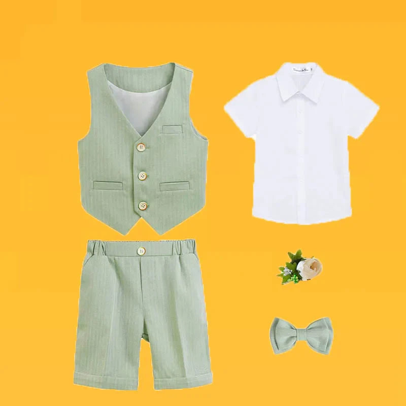 Luxury boys baptism suit set featuring a stylish green and white vest, shirt, shorts, and a matching bowtie, perfect for ages 7-13. Ideal for formal occasions and special celebrations.