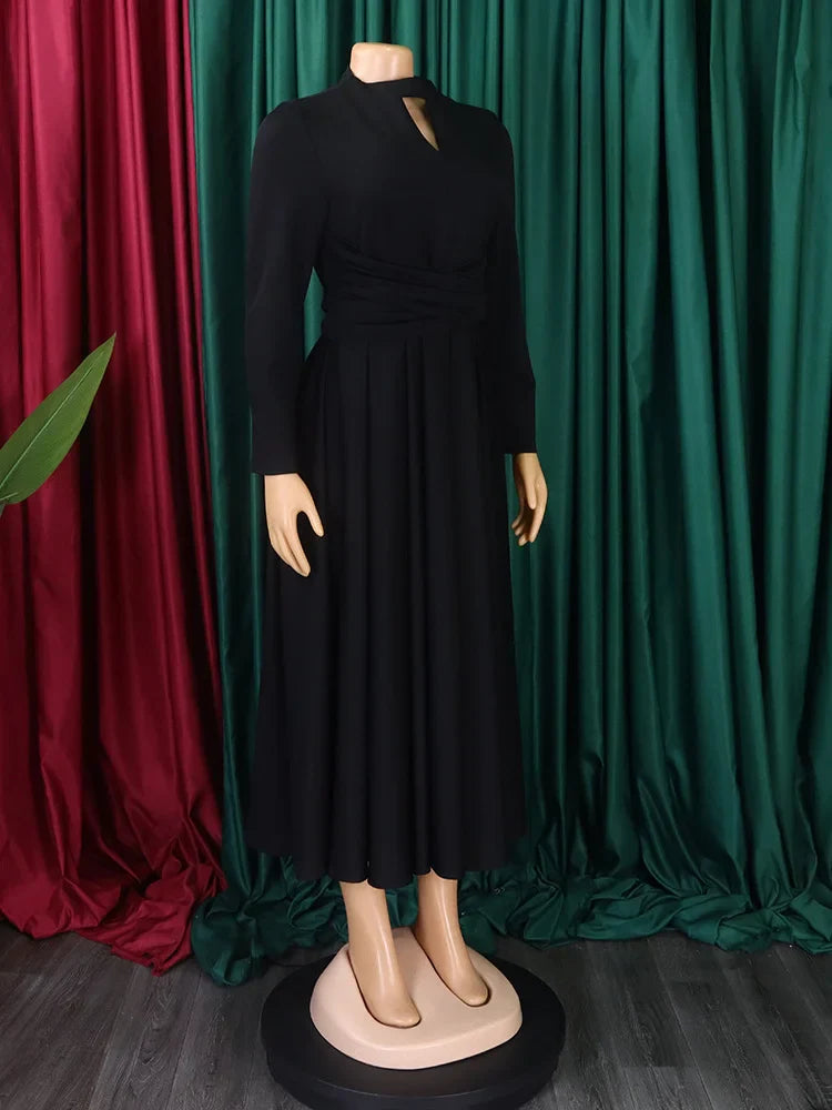 Elegant plus size women's African dress featuring a long dashiki Ankara design, perfect for special occasions.