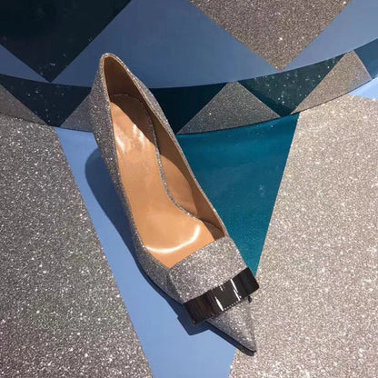Luxury women's glitter high heels pumps in sequined cloth, featuring a pointed toe and thin stiletto heel, perfect for weddings and parties.