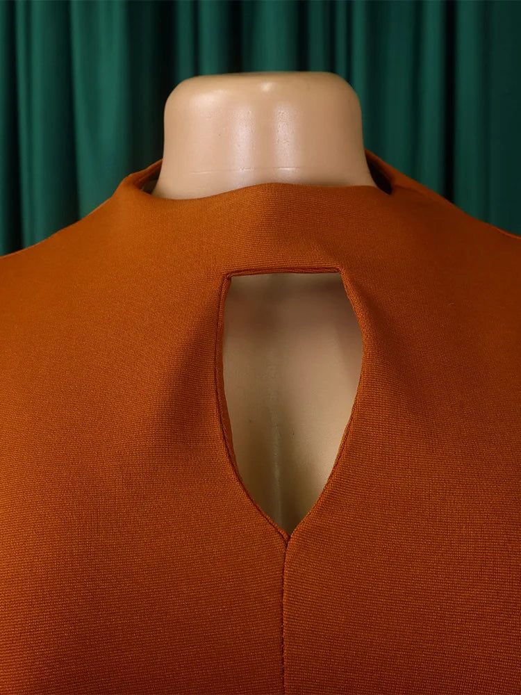 Wmstar Plus Size Women's African Dress presented in a vibrant solid colour, offering a sexy and club-inspired style for the modern woman.