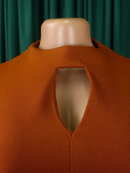 Wmstar Plus Size Women's African Dress presented in a vibrant solid colour, offering a sexy and club-inspired style for the modern woman.