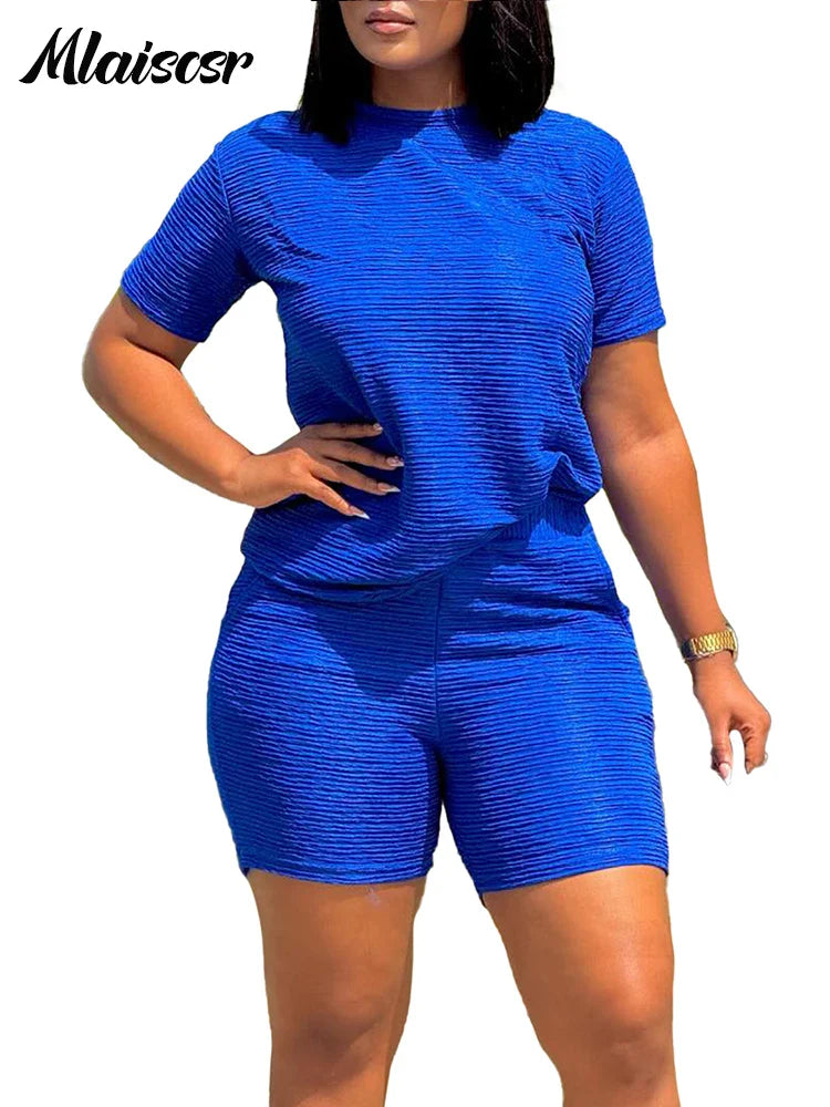 Luxury summer tracksuit for women featuring a chic casual design with solid patterns and a comfortable elastic waist, highlighting versatility and fashionable style.