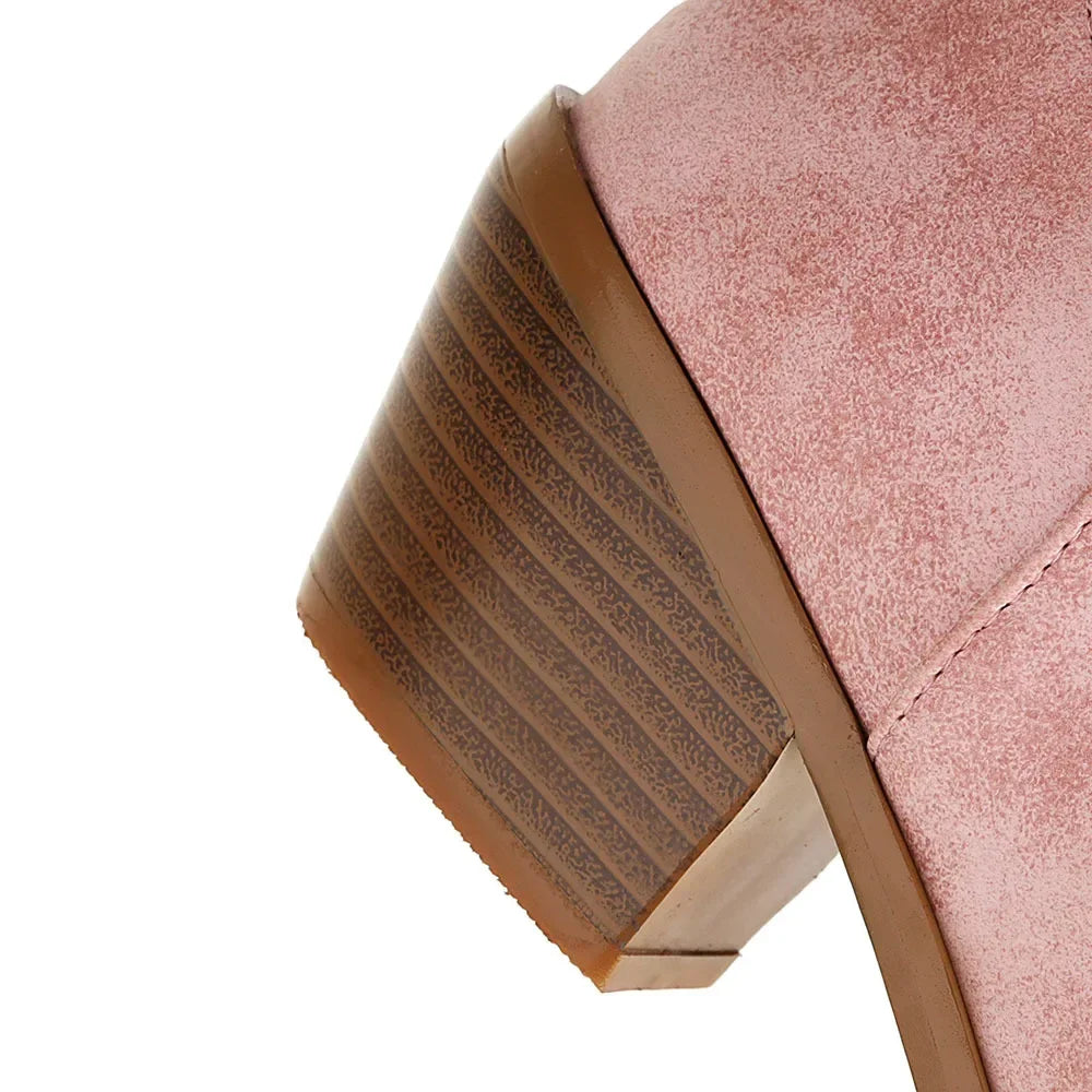 Sophisticated brown PU leather boots for women, knee-high style with a pointed toe and modern square heel for a striking silhouette.