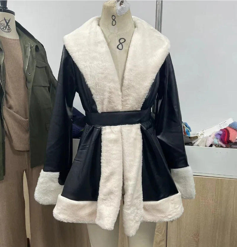 Turn-down collar detail of women's faux leather jacket, showcasing sophisticated design for winter fashion.