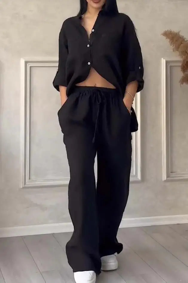 Full view of the women's casual 2 piece set comprising a long sleeve shirt and wide leg pants, showcasing contemporary global fashion trends.