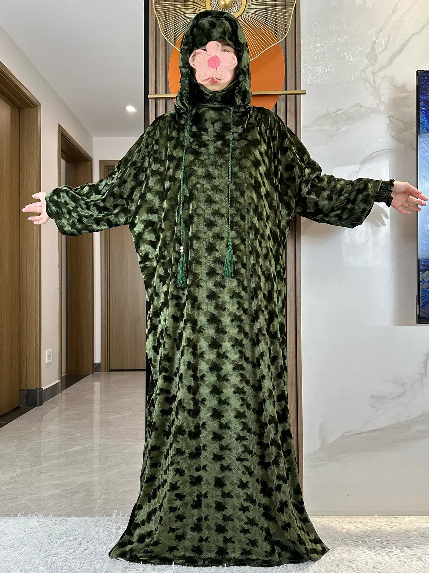 Chic two-hat design luxury Muslim Abaya, epitomising modern style blended with traditional Islamic attire.
