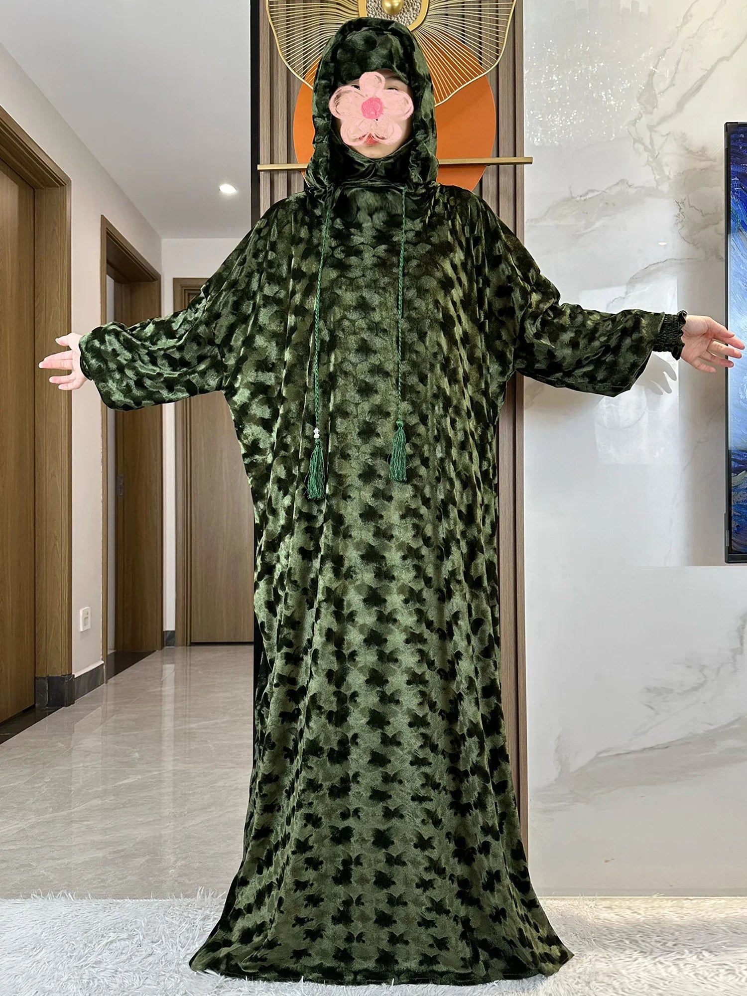 Chic two-hat design luxury Muslim Abaya, epitomising modern style blended with traditional Islamic attire.