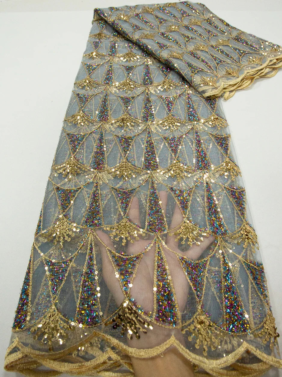 Premium African lace fabric adorned with sparkling sequins, suitable for high-end fashion designs and special occasions.