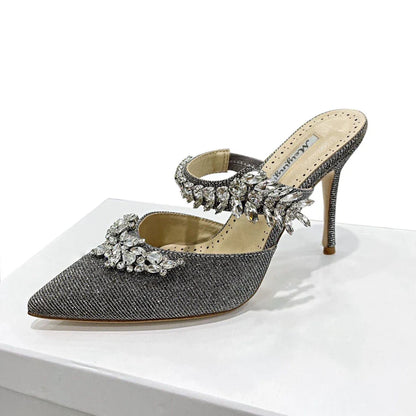 Stylish silk mules sandals with a refined design, ideal for summer wear, featuring a low thin heel and sparkling crystal embellishments.
