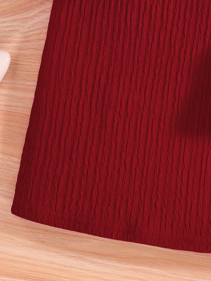 Girls' fashion in focus with a luxurious red O-neck knitted dress adorned with a decorative bow, designed for ages 7-13, suitable for autumn season.