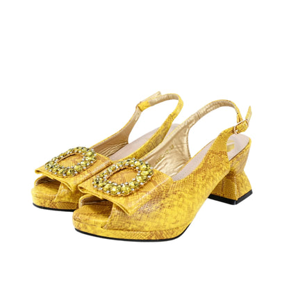 Chic slingback mid heels with a fashionable crystal embellishment, ideal for women's elegant footwear collection.