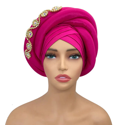 Close-up view of the Gorgeous Twisted Braid Turban Cap, highlighting the luxurious raw silk texture and intricate beading details, perfect for special events.