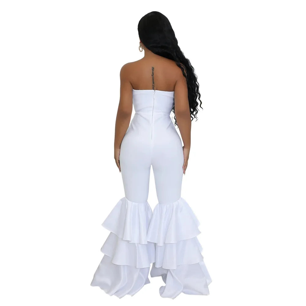 Stylish ankle-length pants of an elegant strapless jumpsuit, highlighting the sleek silhouette and ruffled detailing for a chic fashion statement.