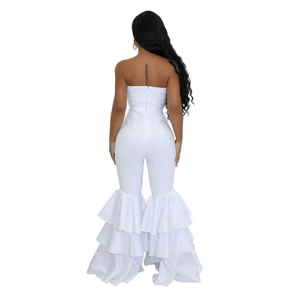 Stylish ankle-length pants of an elegant strapless jumpsuit, highlighting the sleek silhouette and ruffled detailing for a chic fashion statement.