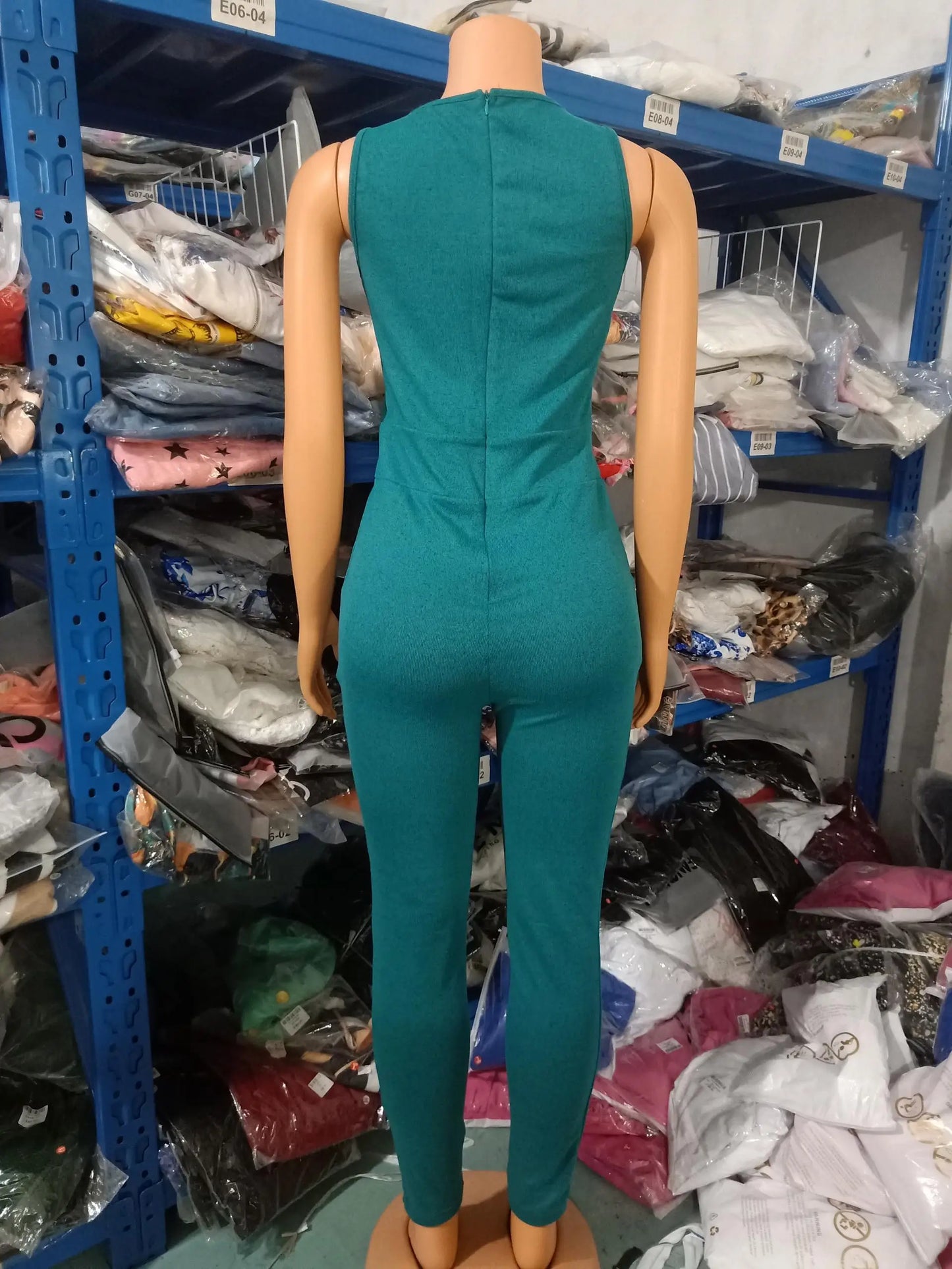 Elegant side view of a women’s jumpsuit set showcasing its modern high waist design and functional drawstring pockets, ideal for fashionable outings.
