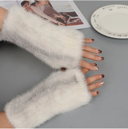 High-quality real mink fur gloves, designed for women who appreciate luxury and comfort while typing.