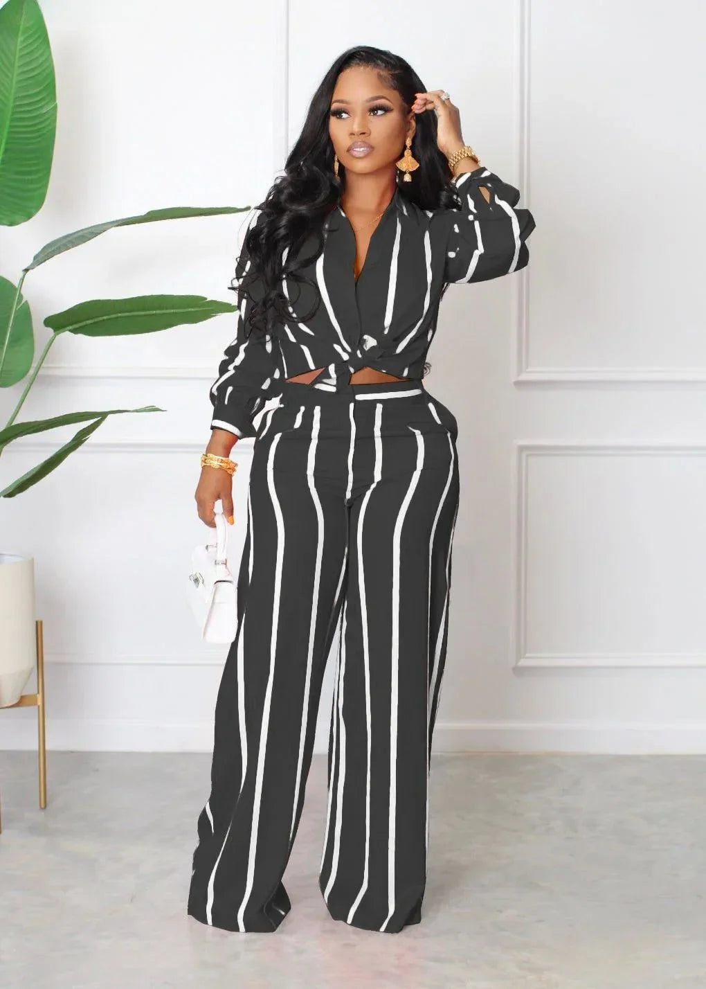 Elegant women's luxe casual two-piece set featuring a stylish striped long pant and shirt ensemble, perfect for sophisticated outings.